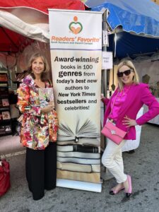 Narrator Laura Schreiber and Author Mary K. Savarese at Readers Favorite book booth